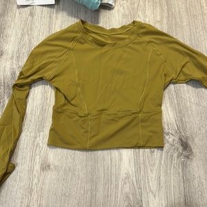 mustard green active cropped long sleeve in XS